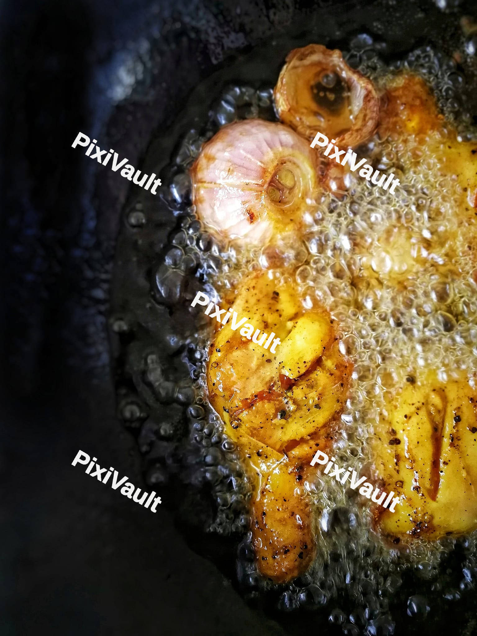 Chicken legs in the boiling oil